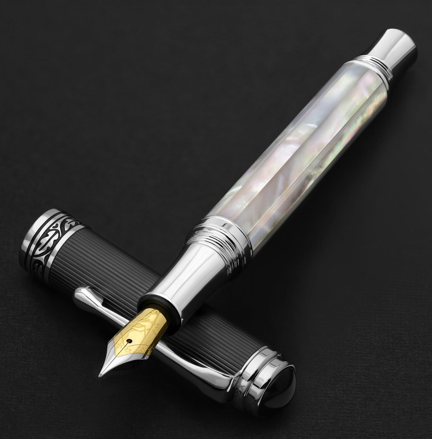 Xezo - Maestro White MOP PVD F Fountain pen resting on its cap