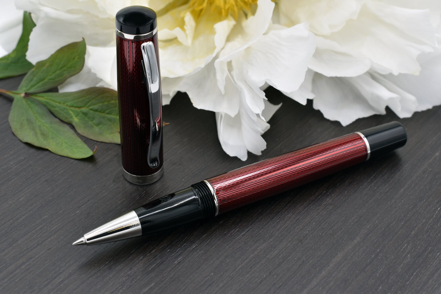 Incognito Burgundy R-1 Rollerball pen with a peony flower