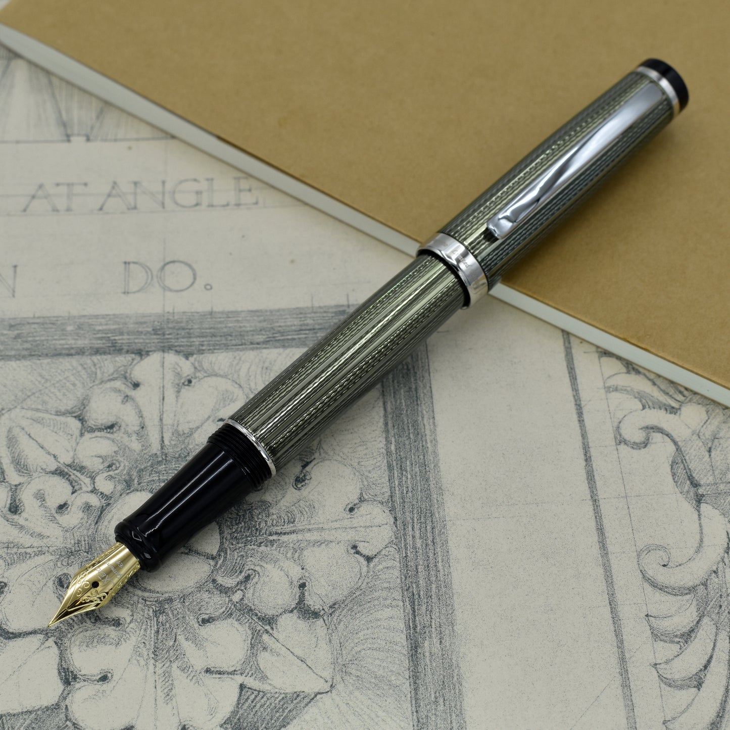 Incognito Zinc EF Fountain pen with antique architectural sketches and a notebook
