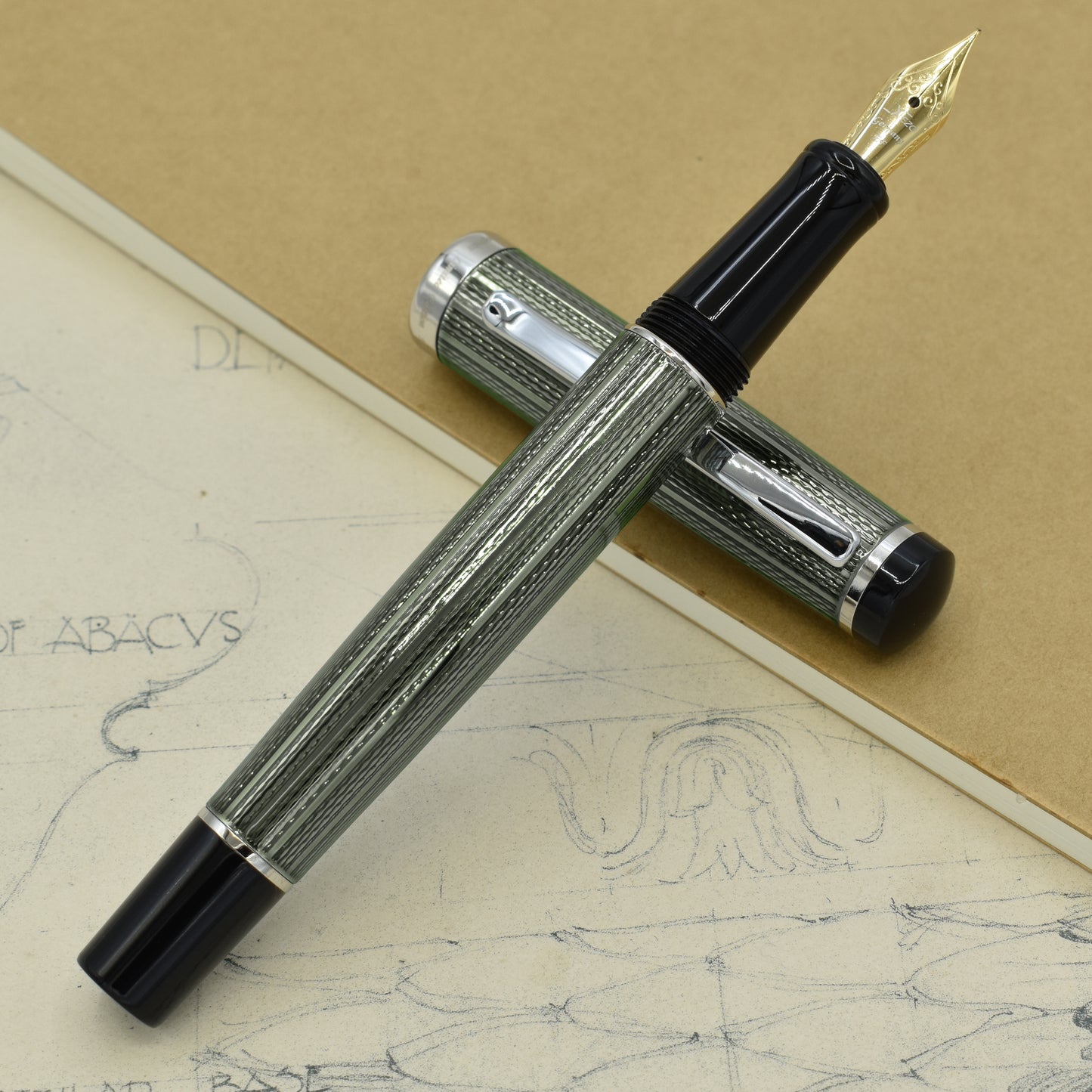Incognito Zinc EF Fountain pen with antique architectural sketches and a notebook