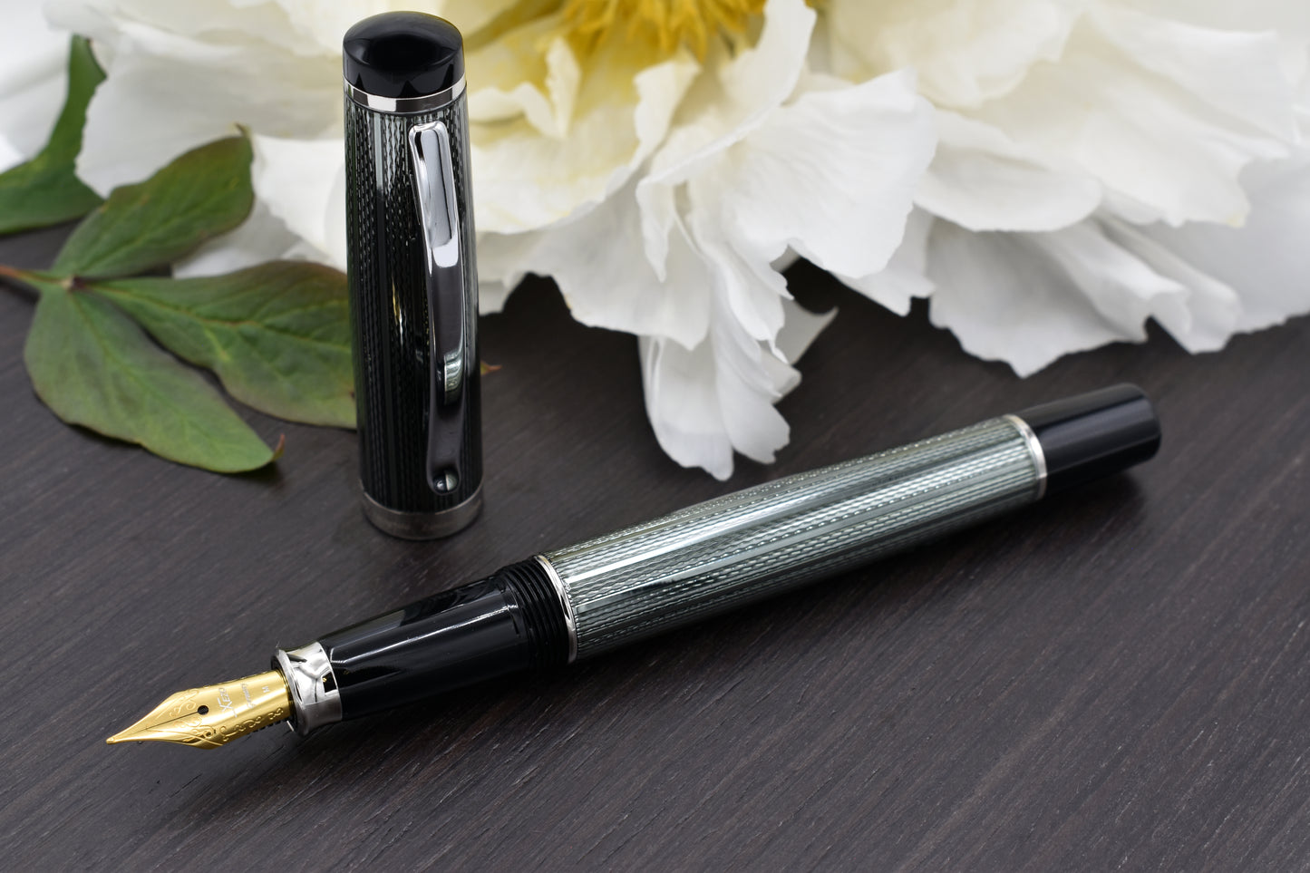 Incognito Zinc FM Fountain pen with a peony flower