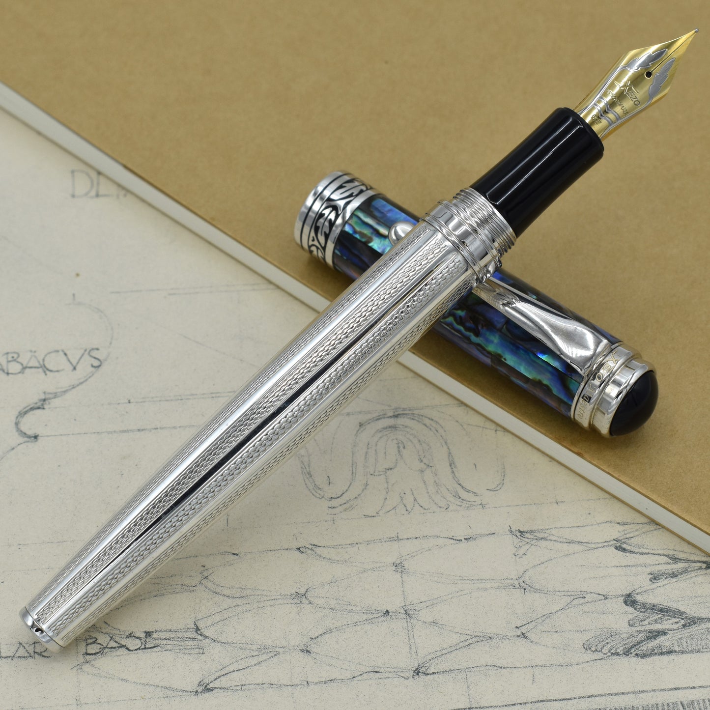 Maestro 925 Sea Shell EFP Fountain pen with antique architectural sketches and a notebook