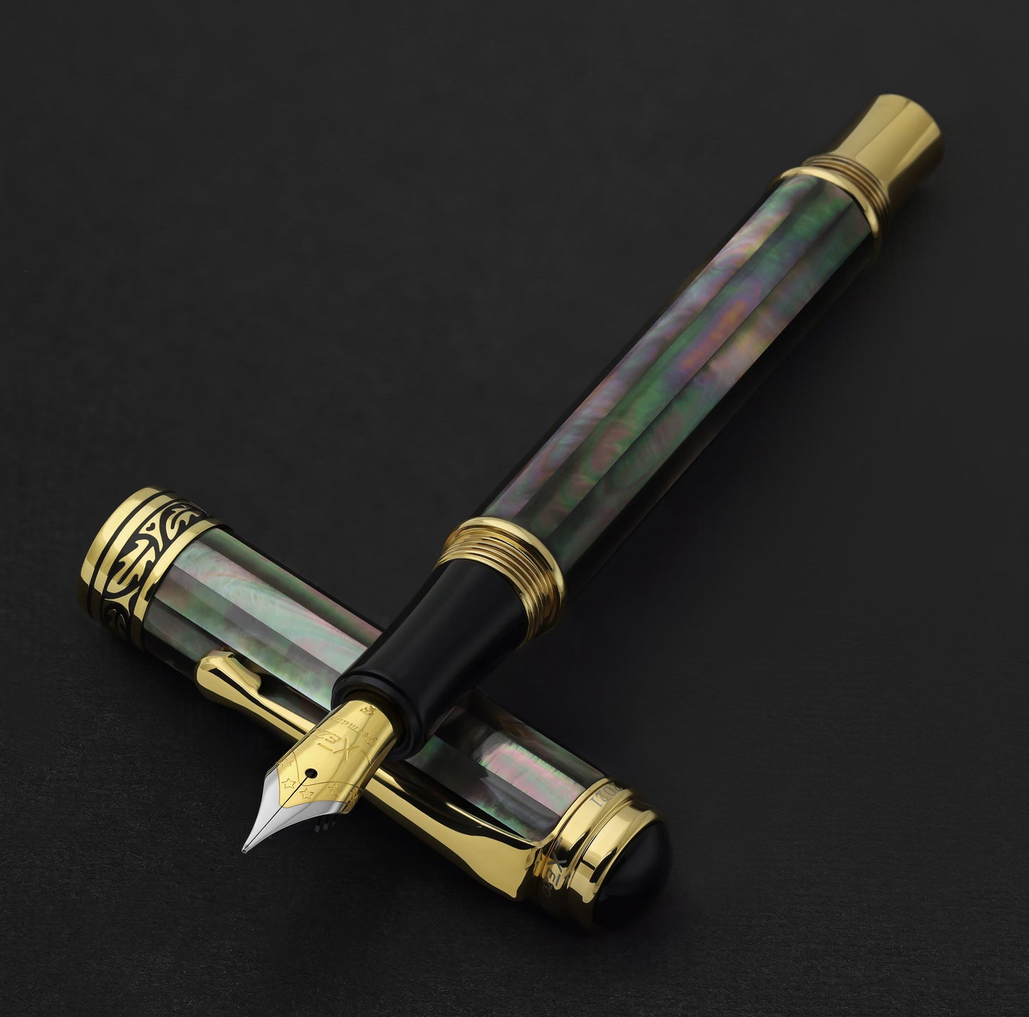 Xezo - Maestro Tahitian Black MOP F Fountain pen resting on its cap