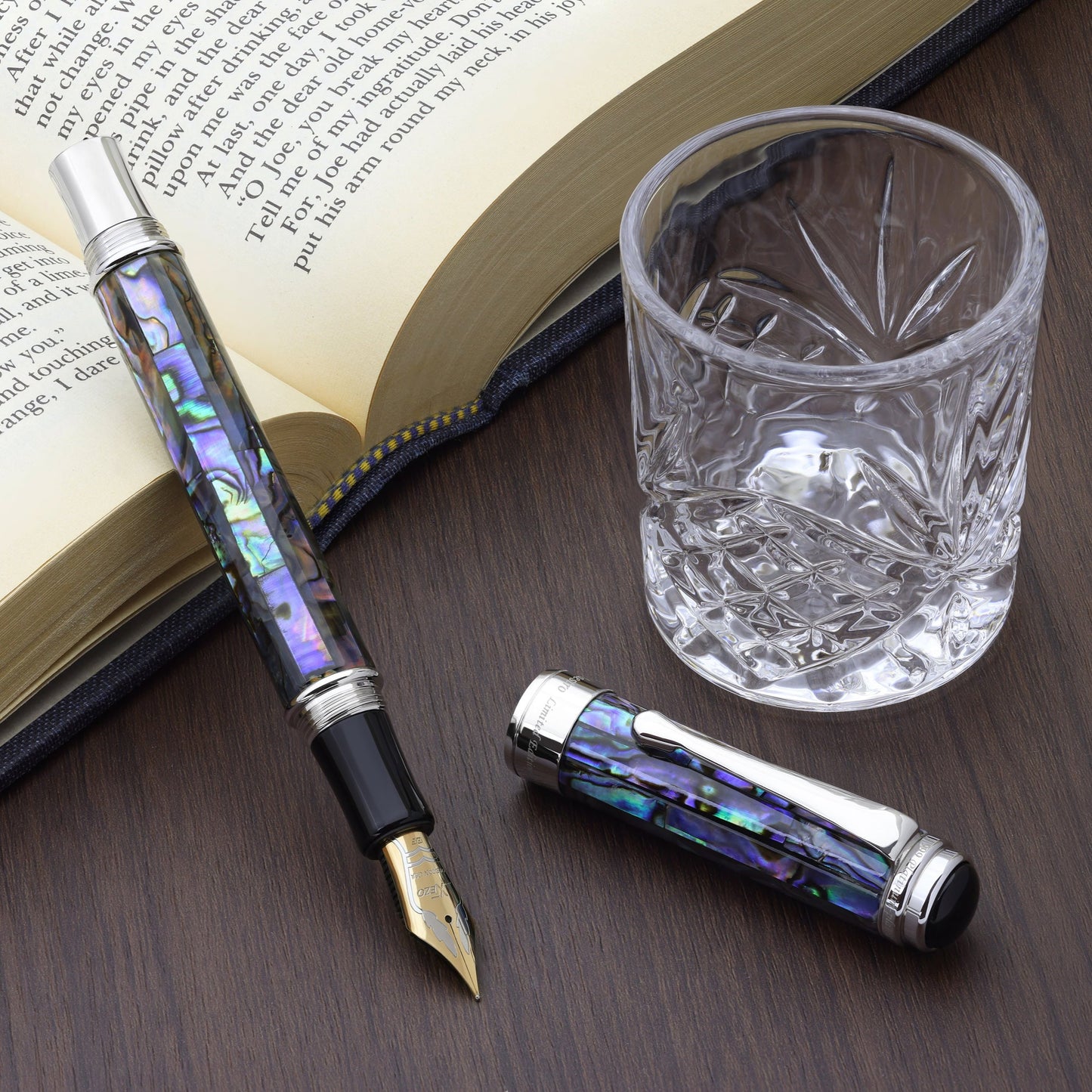 Maestro Sea Shell FP-EF Fountain pen with a book and glass cup