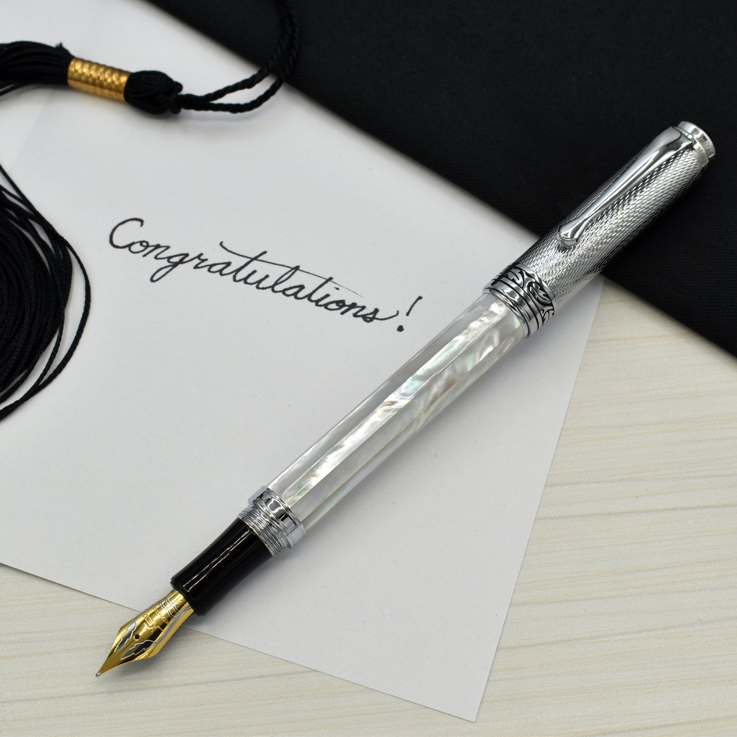 Maestro White MOP Chrome FM-2 Fountain pen with a graduation and a note that reads "Congratulations!"