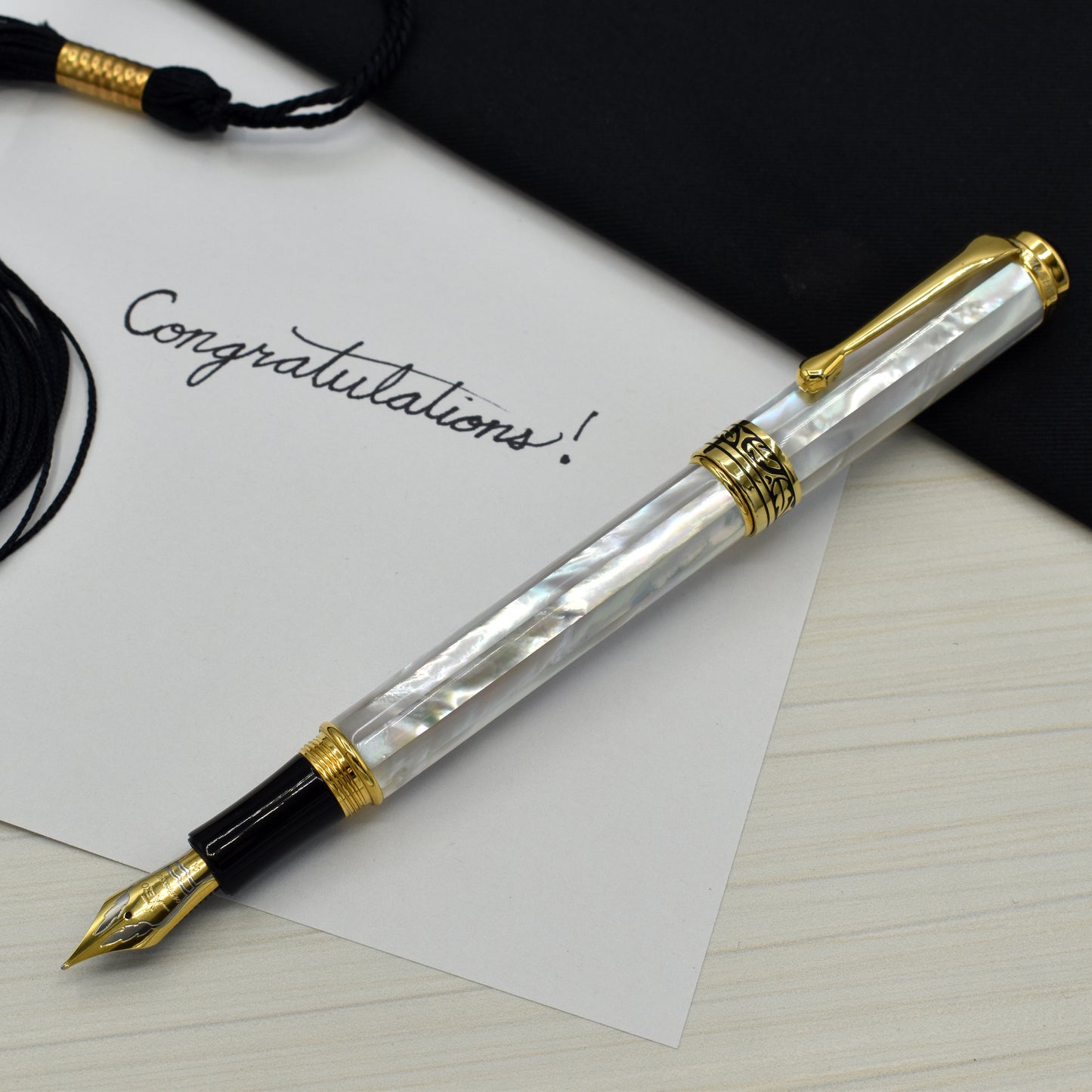 Maestro White MOP FM-2 Fountain pen with a graduation and a note that reads "Congratulations!"