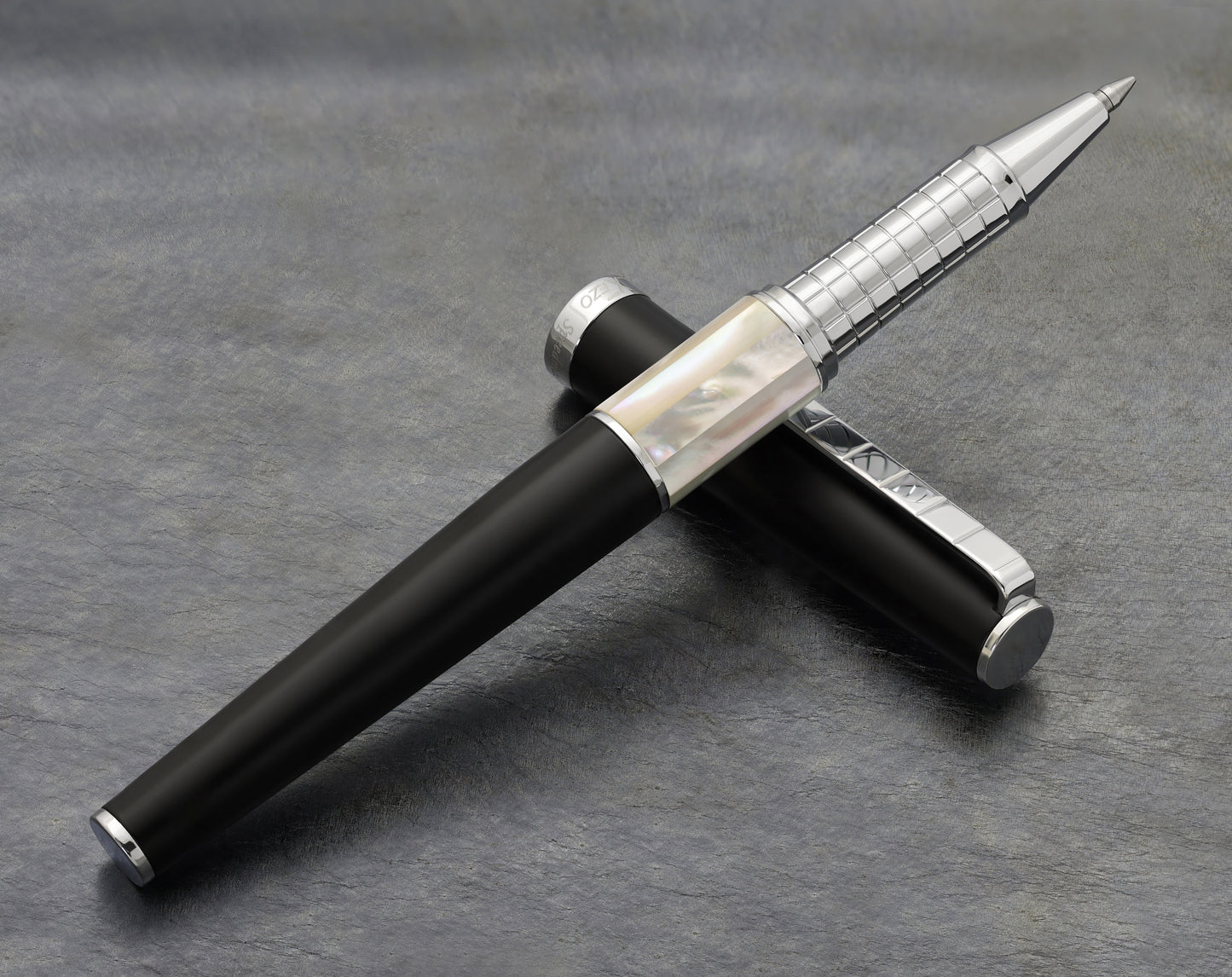 Speed Master Black R-WC Rollerball pen on a dark background
