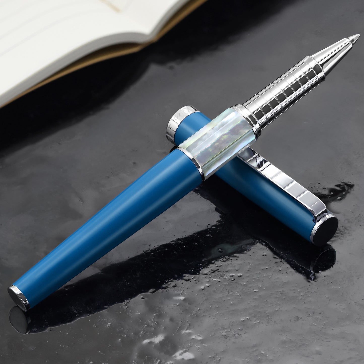 Speed Master Lapis Blue R-WC Rollerball pen on a dark background