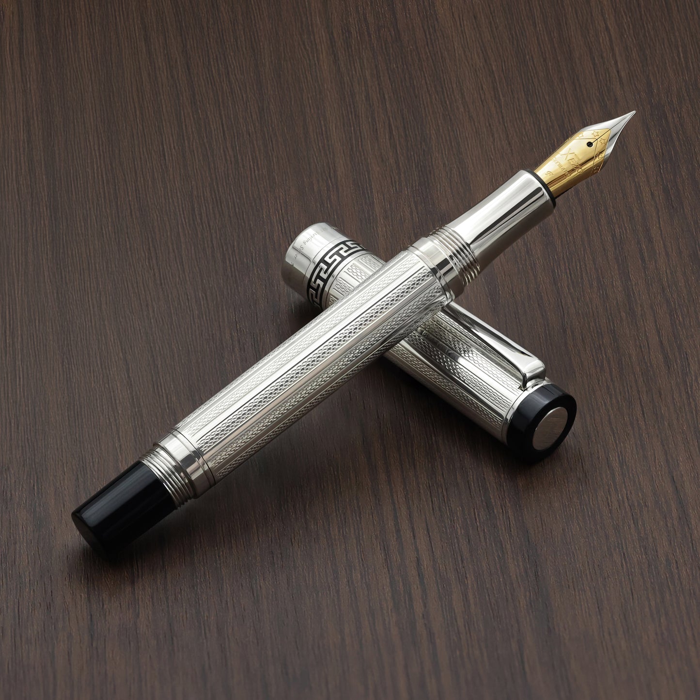 Tribune 925 Sterling Silver F Fountain pen on a wood background