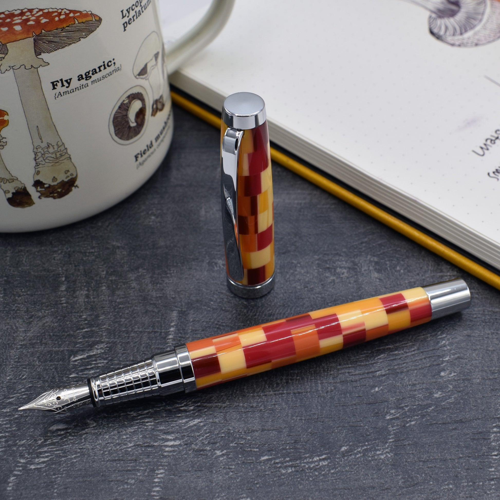 Urbanite Red FM Fountain pen with whimsical red mushroom mug and sketchbook