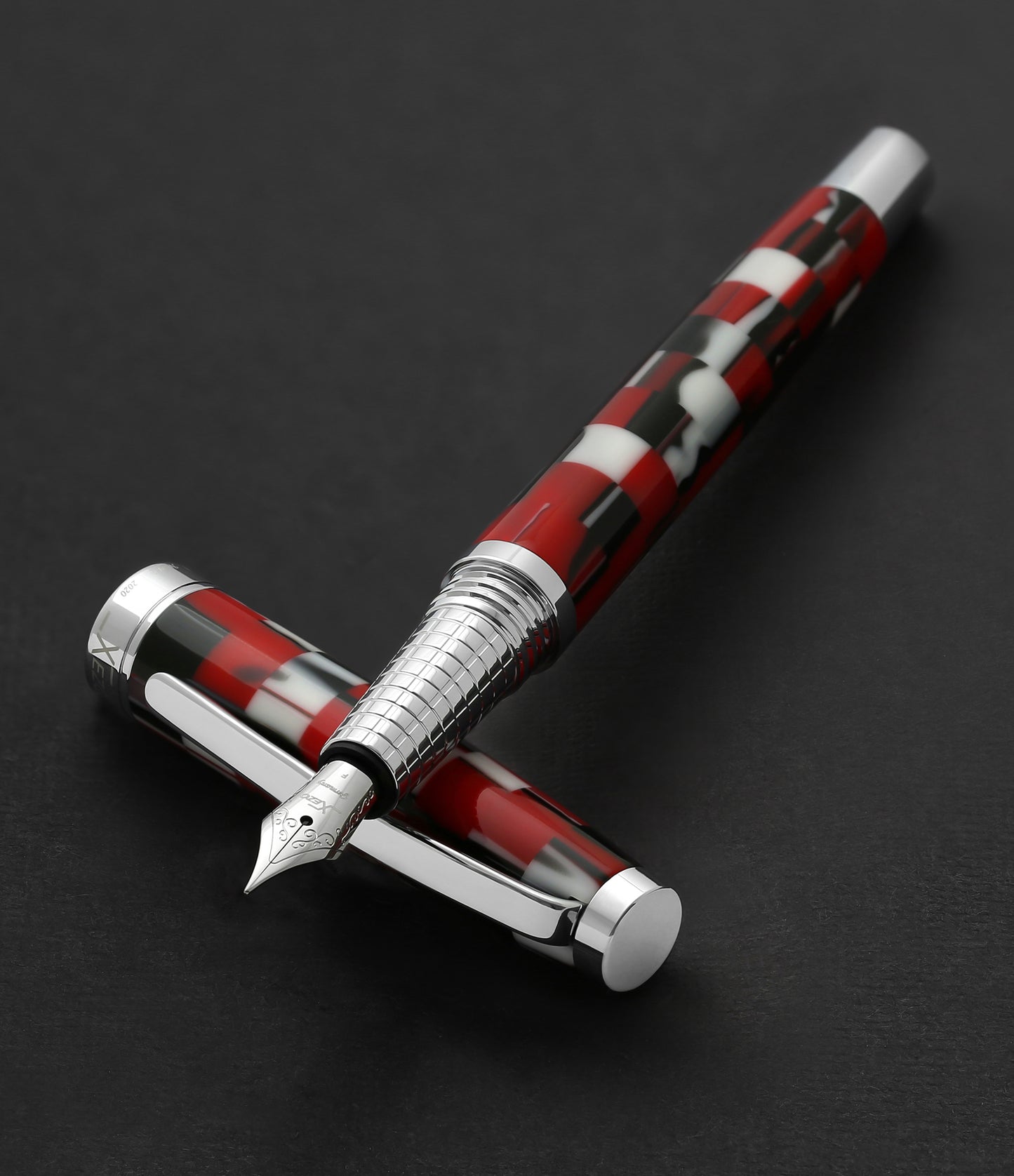 Xezo - Urbanite II Trek F fountain pen resting on its cap