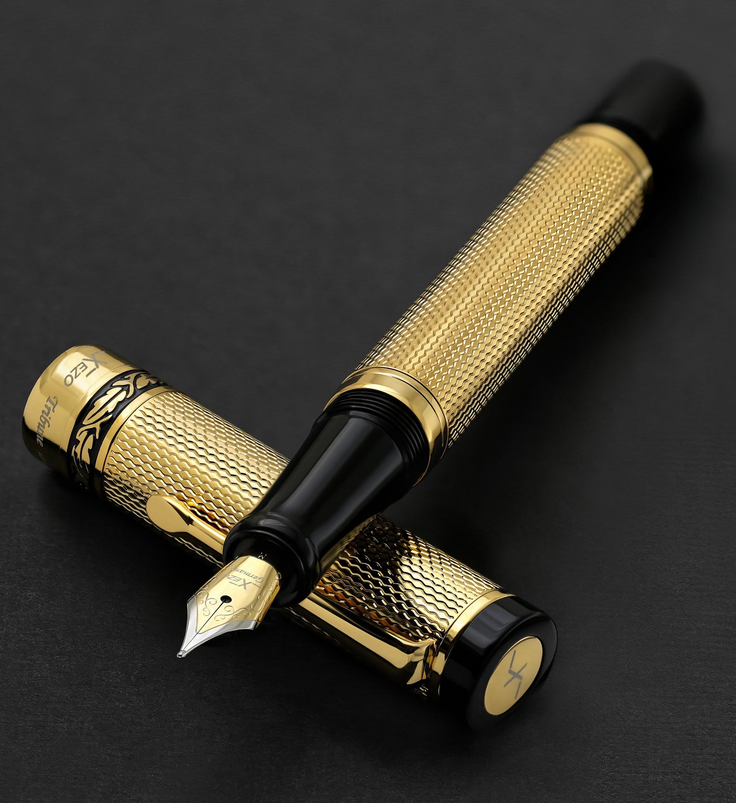 Xezo - Tribune Gold FM fountain pen resting on its cap