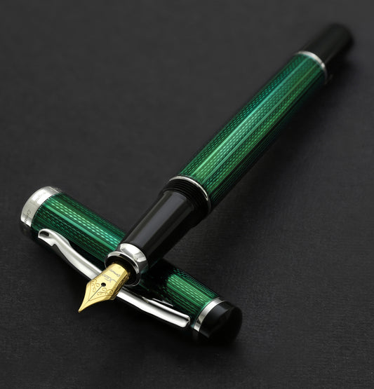 Xezo - Incognito Forest FM fountain pen resting on its cap