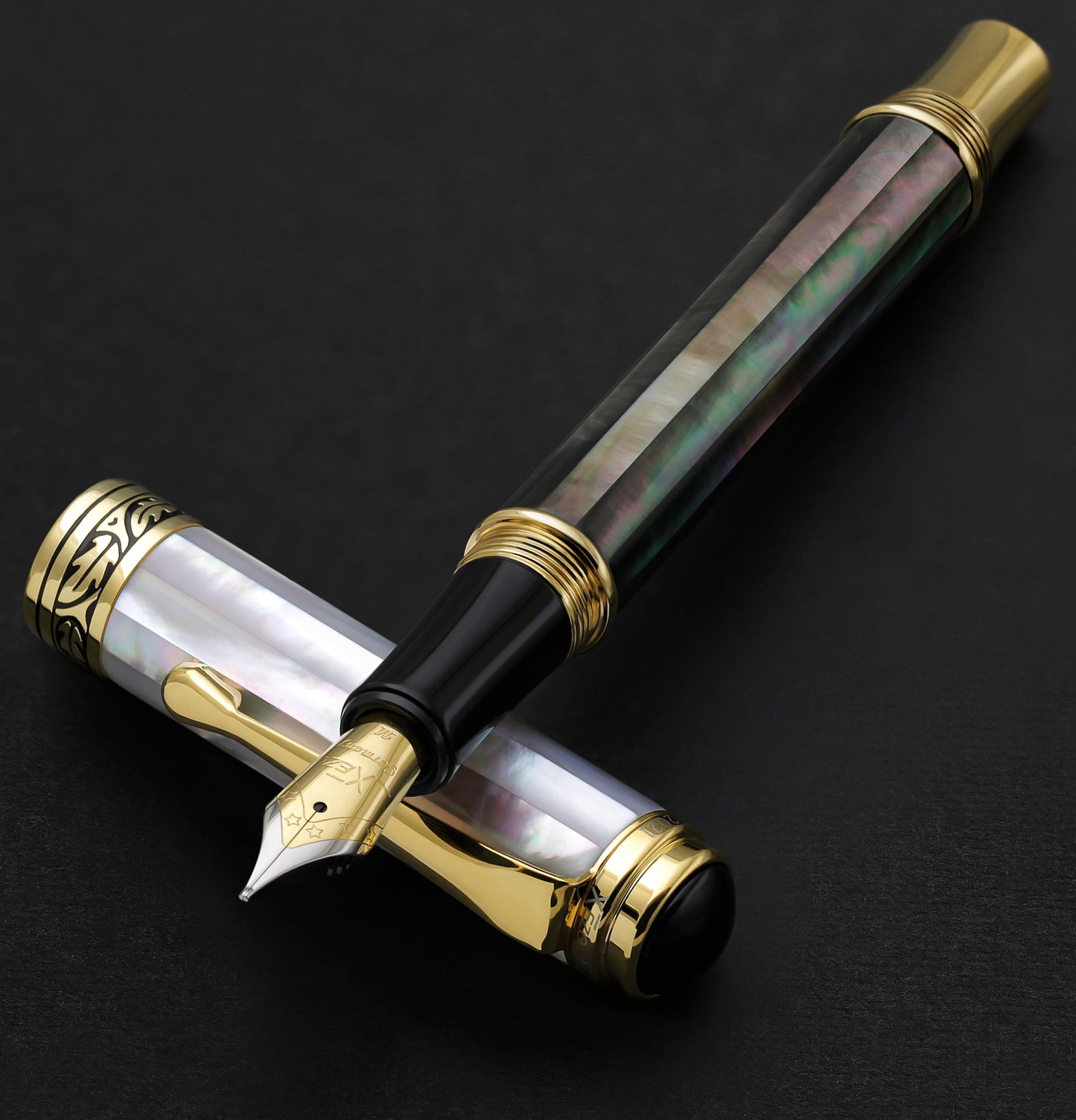 Xezo - Maestro Black and White MOP FMG fountain pen resting on its cap