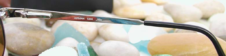 Xezo - Right temple of a pair of Airman 5200 sunglasses from inside. The print on the temple reads "AIRMAN 5200 Xezo".