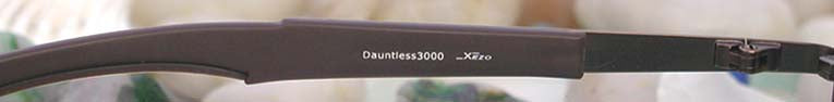 Xezo - Left temple of Dauntless 3000 sunglasses from inside. The print of the temple reads "Dauntless3000 Xezo".