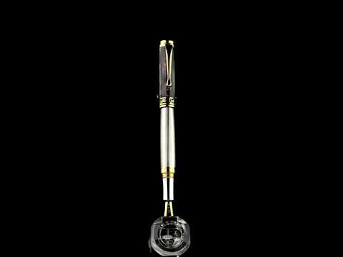 Xezo - A Maestro 925 BL MOP FMG Fountain pen standing on a turning pen stand