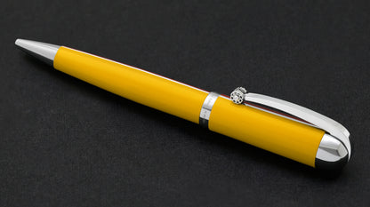 Xezo - Visionary Aspen/Red B Ballpoint pen resting on a dark background

