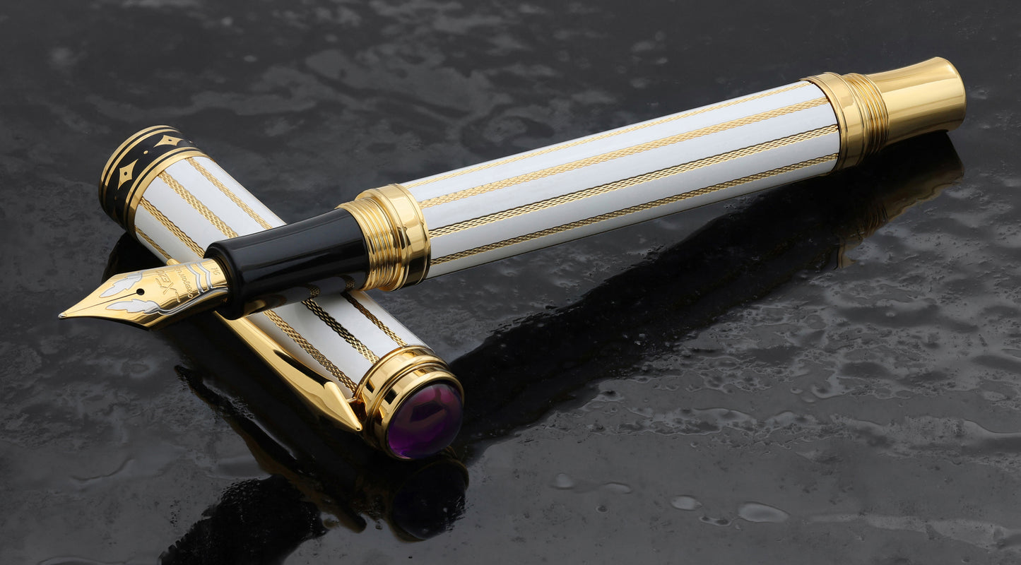 Xezo Maestro® Streamliner Amethyst FM pen and cap displayed on a textured dark gray surface.