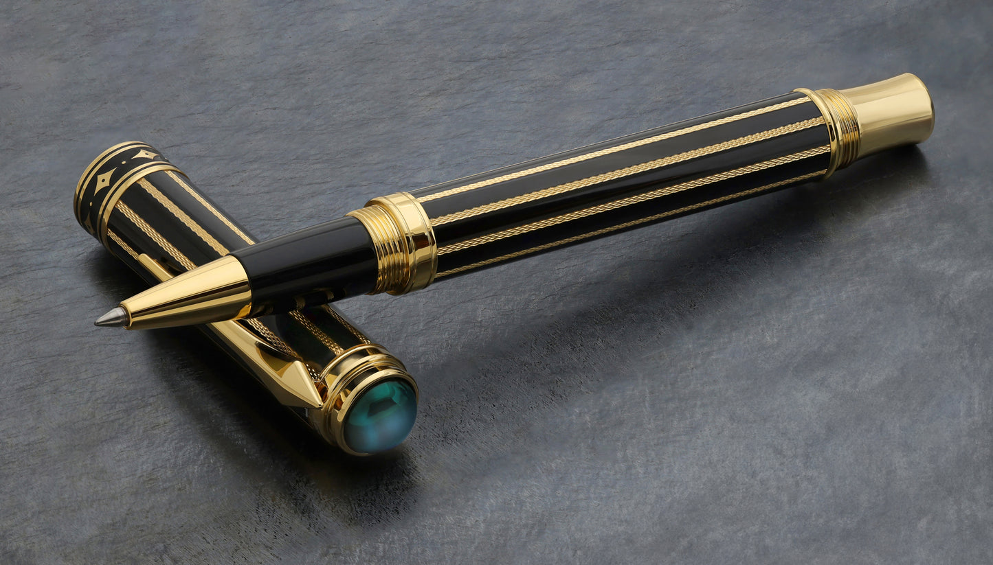 A Xezo Maestro® Streamliner Labradorite R pen and cap displayed on a textured dark gray surface.