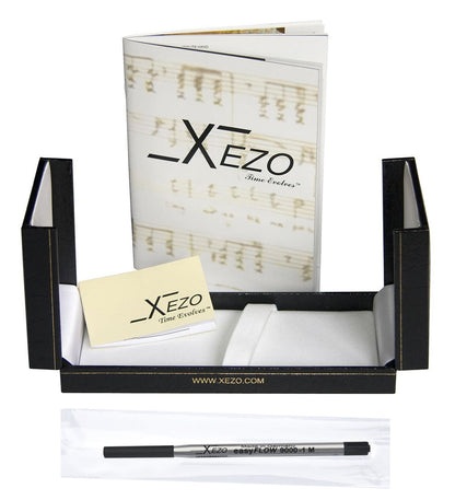 Xezo clam shell box with manual, one ball point refill, and warranty card on a white background.