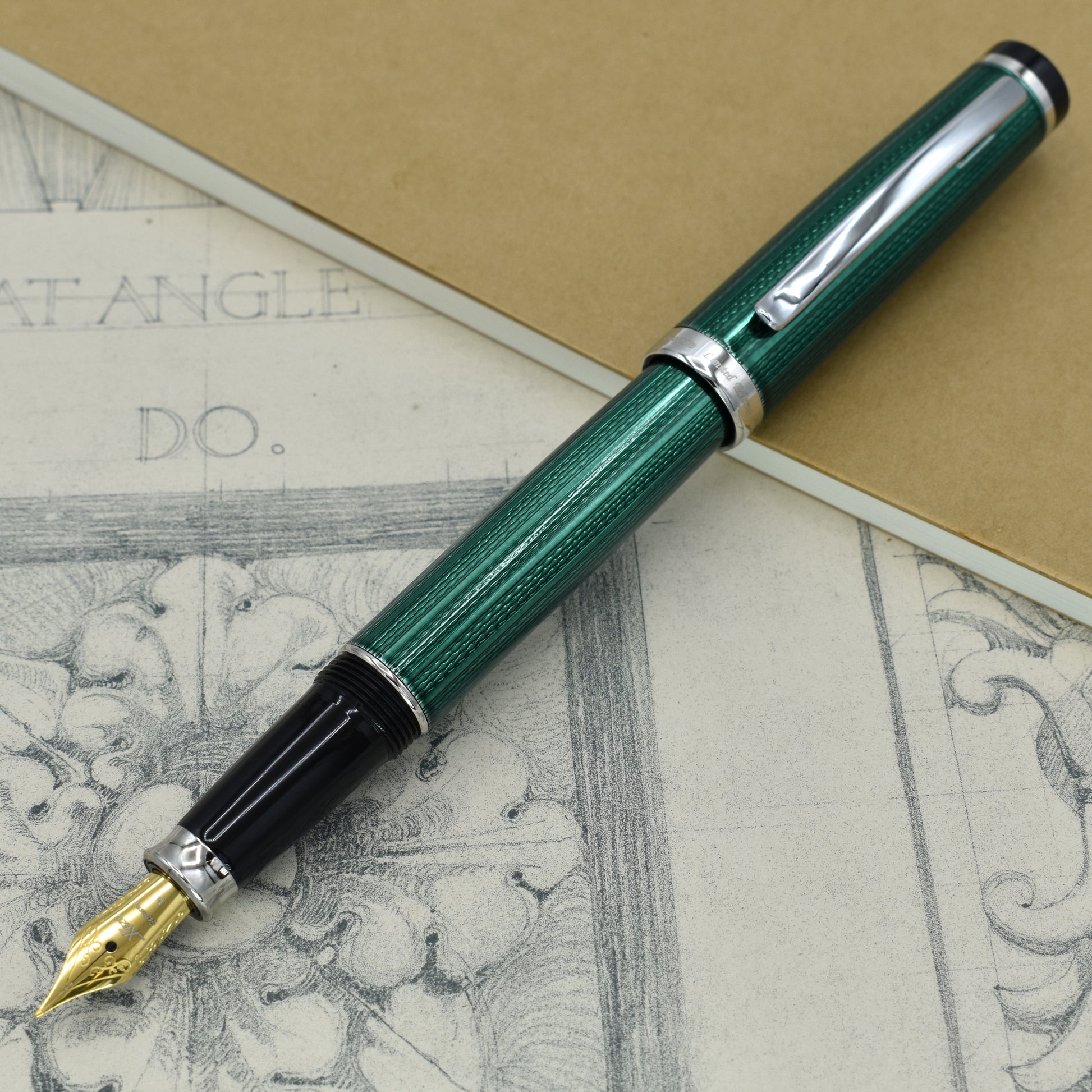 Incognito Forest FM Fountain pen with antique architectural sketches and a notebook
