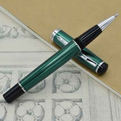 Incognito Forest R Rollerball pen with antique architectural sketches and a notebook