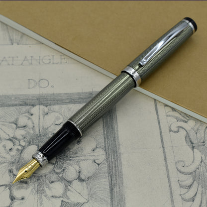 Incognito Zinc FM Fountain pen with antique architectural sketches and a notebook