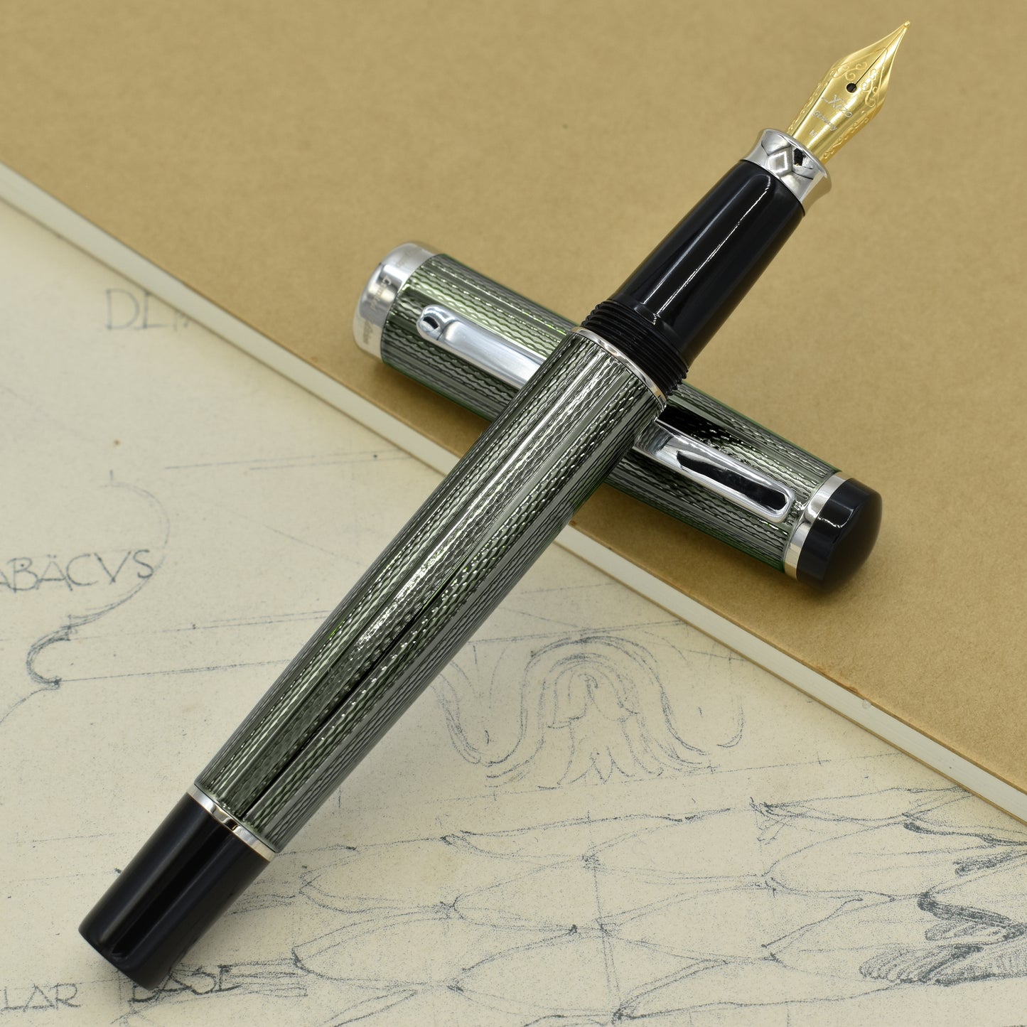 Incognito Zinc FM Fountain pen with antique architectural sketches and a notebook