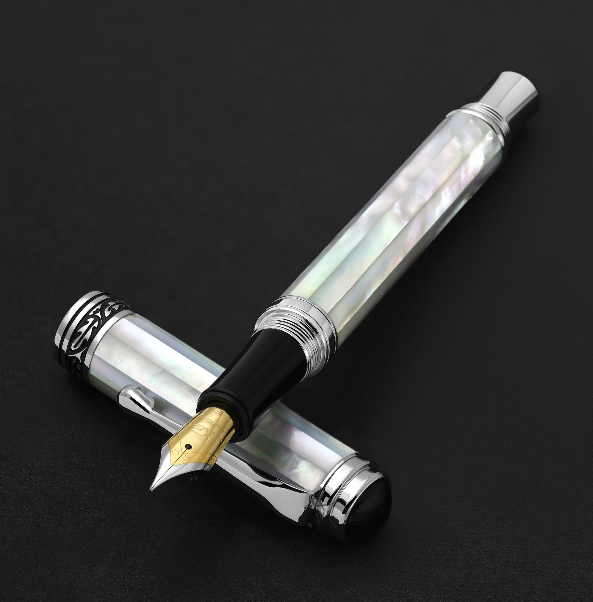 Xezo - Maestro All White MOP Chrome F Fountain pen resting on its cap