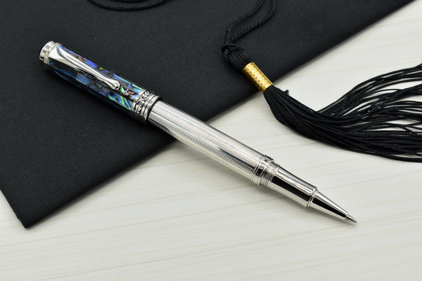 Maestro 925 Sea Shell RP Rollerball pen with a graduation cap