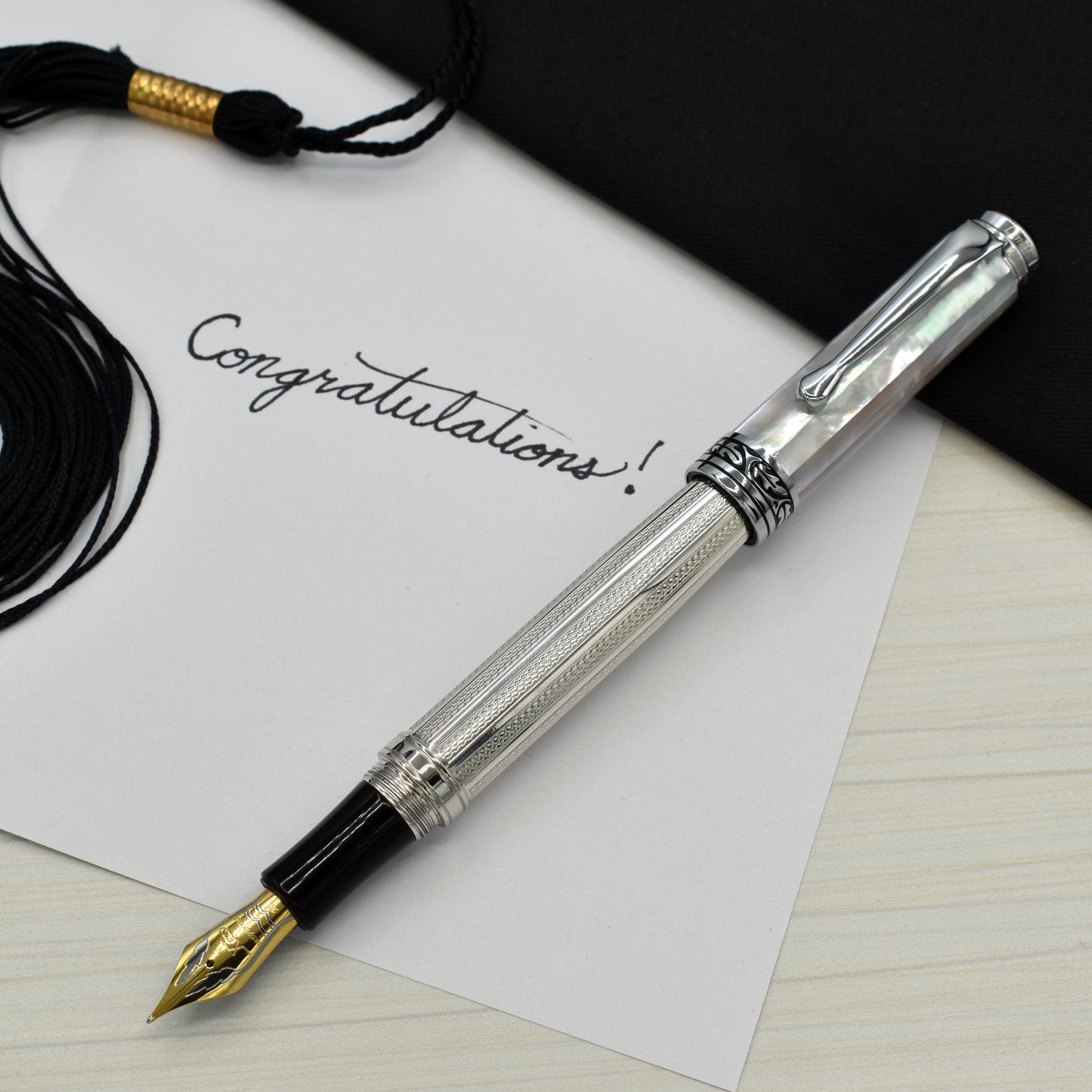 Maestro 925 White MOP FM-SL Fountain pen with a graduation and a note that reads "Congratulations!"