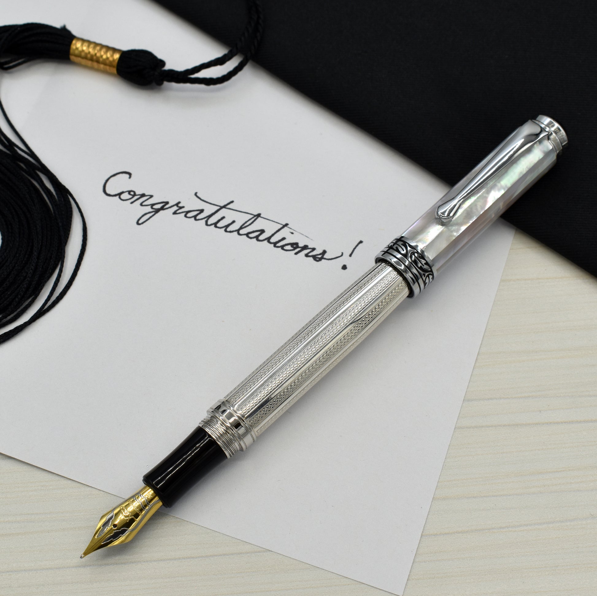 Maestro 925 White MOP FM-SL Fountain pen with a graduation and a note that reads "Congratulations!"