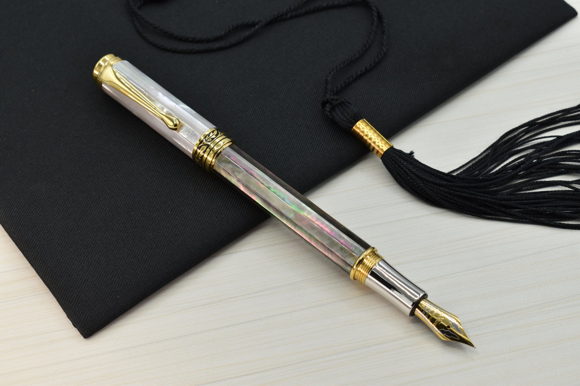 Maestro Black and White MOP EFG Fountain pen with a graduation cap