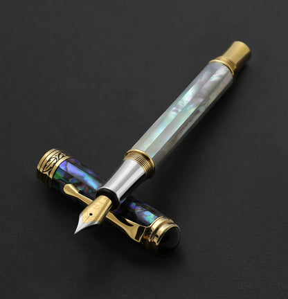 Xezo - Maestro MOP Sea Shell F Fountain pen resting on its cap