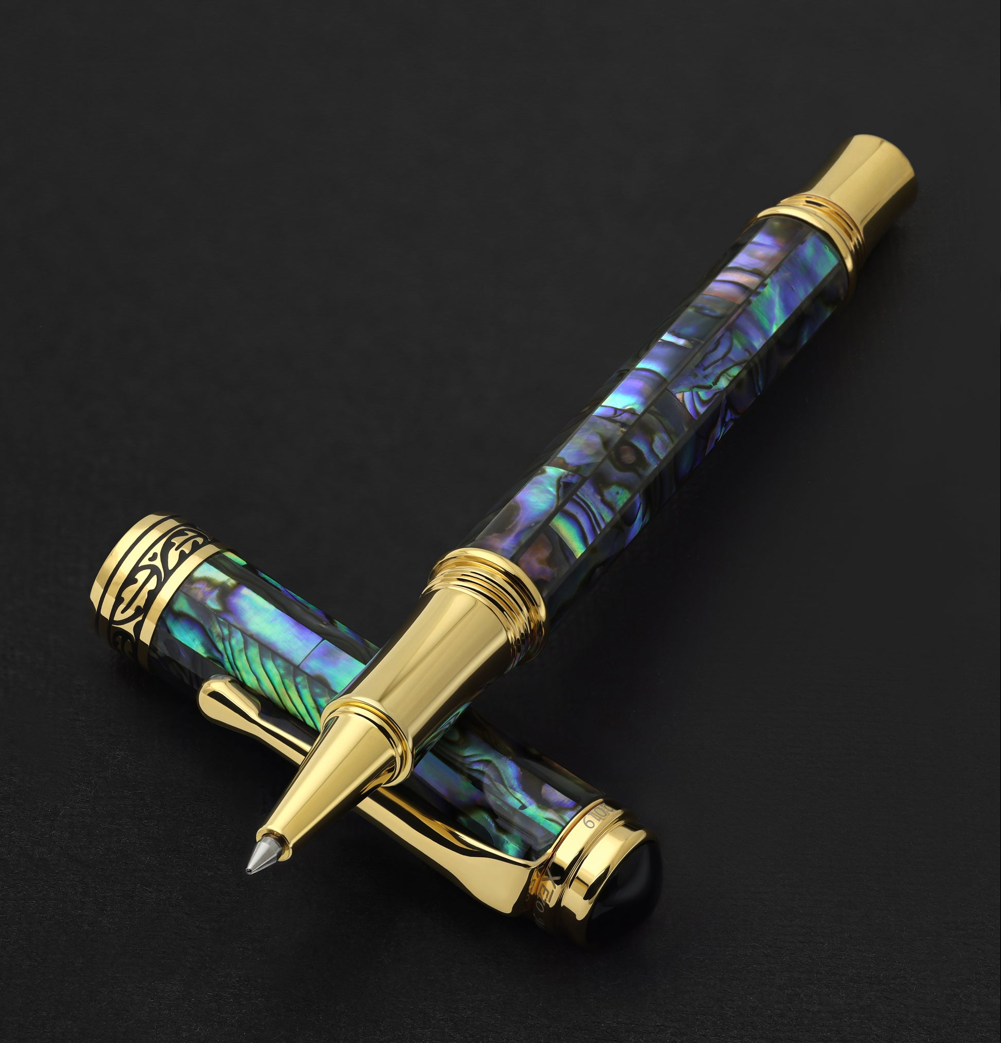 Xezo - Maestro Sea Shell RPG-1A Rollerball pen resting on its cap