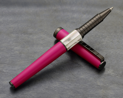 Speed Master Cerise R-WGM Rollerball pen on a dark background