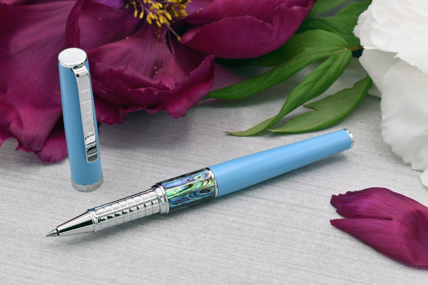 Speed Master Sky Blue R-AC Rollerball pen with a peony flower