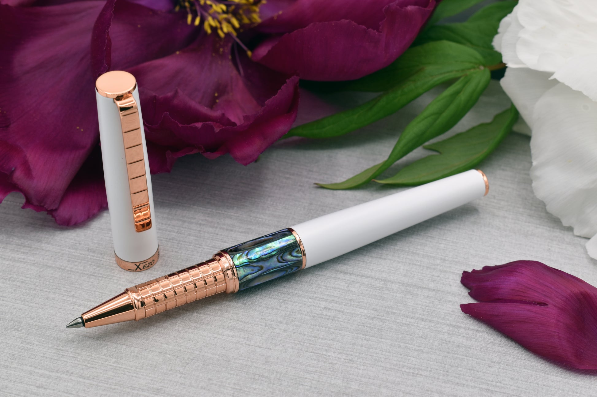 Speed Master White R-ARG Rollerball pen with a peony flower
