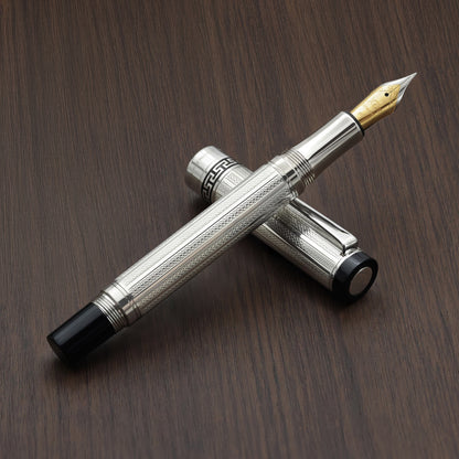 Tribune 925 Sterling Silver F Fountain pen on a wood background