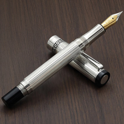 Tribune 925 Sterling Silver F Fountain pen on a wood background