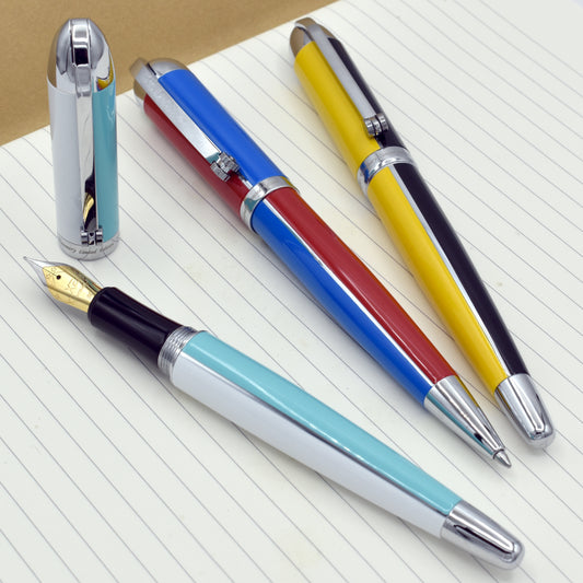 Three Xezo Visionary pens on a notepad