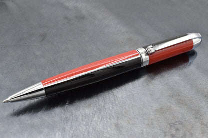 Visionary Red/Black B Ballpoint pen on a dark background