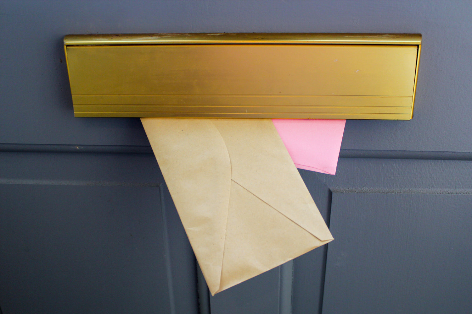 Envelope Falling Through a Letter Box