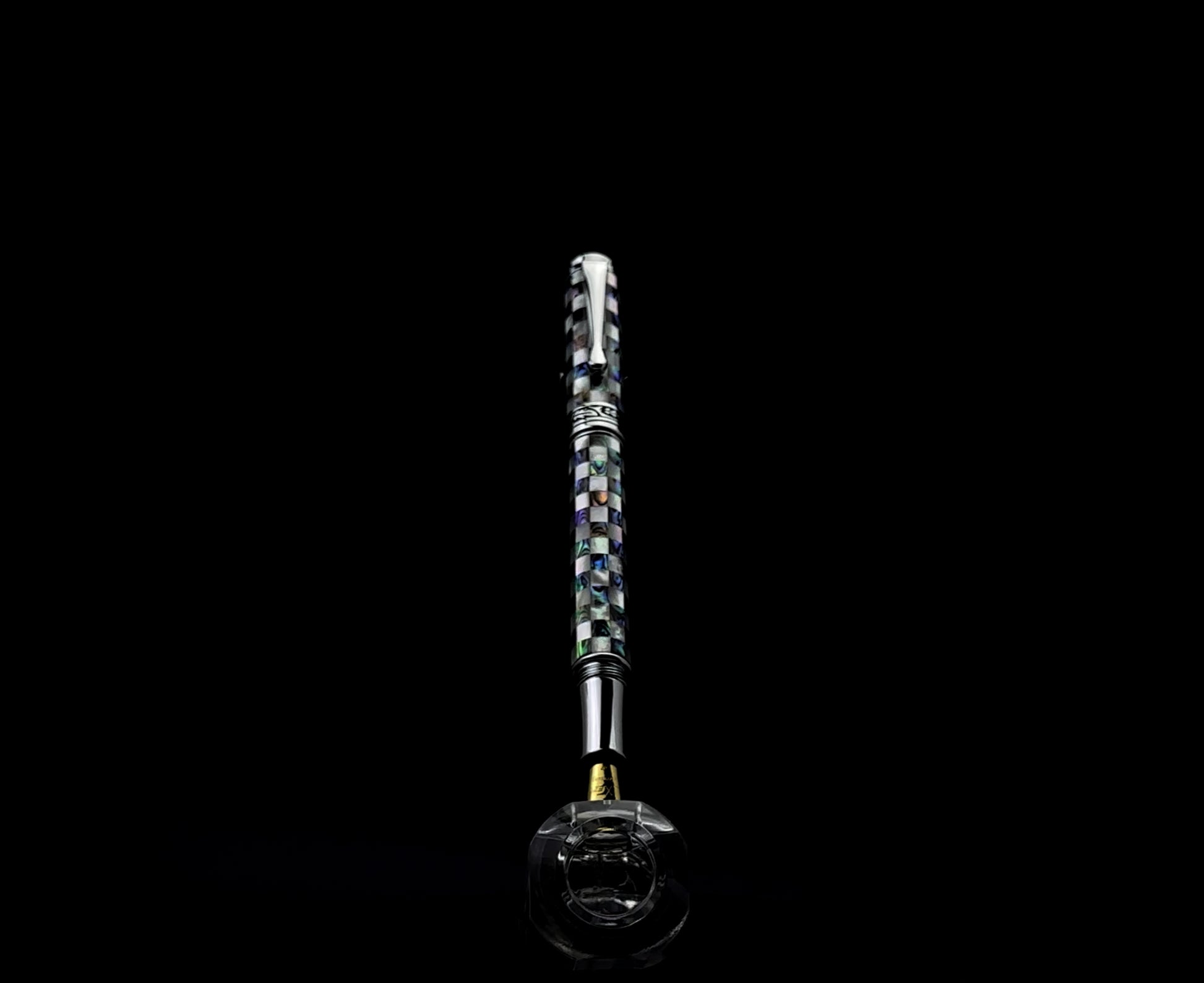 Xezo - A Maestro Jubilee Classic Of The Ocean EF Fountain pen standing on a turning pen stand