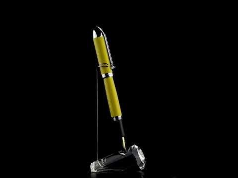 Xezo - A Visionary Speed Yellow/Black F Fountain pen standing on a turning pen stand