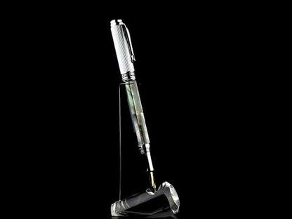 Xezo - A Maestro Black MOP Chrome FM Fountain pen standing on a turning pen stand