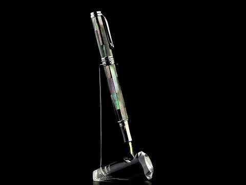 Xezo - A Maestro Black Mother of Pearl FBP-M Fountain pen standing on a turning pen stand