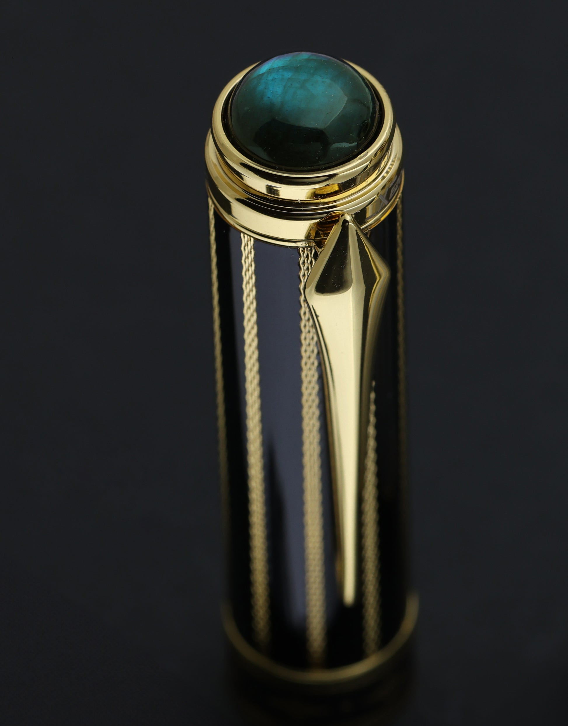A Xezo Maestro® Streamliner Labradorite R cap set against a dark background.