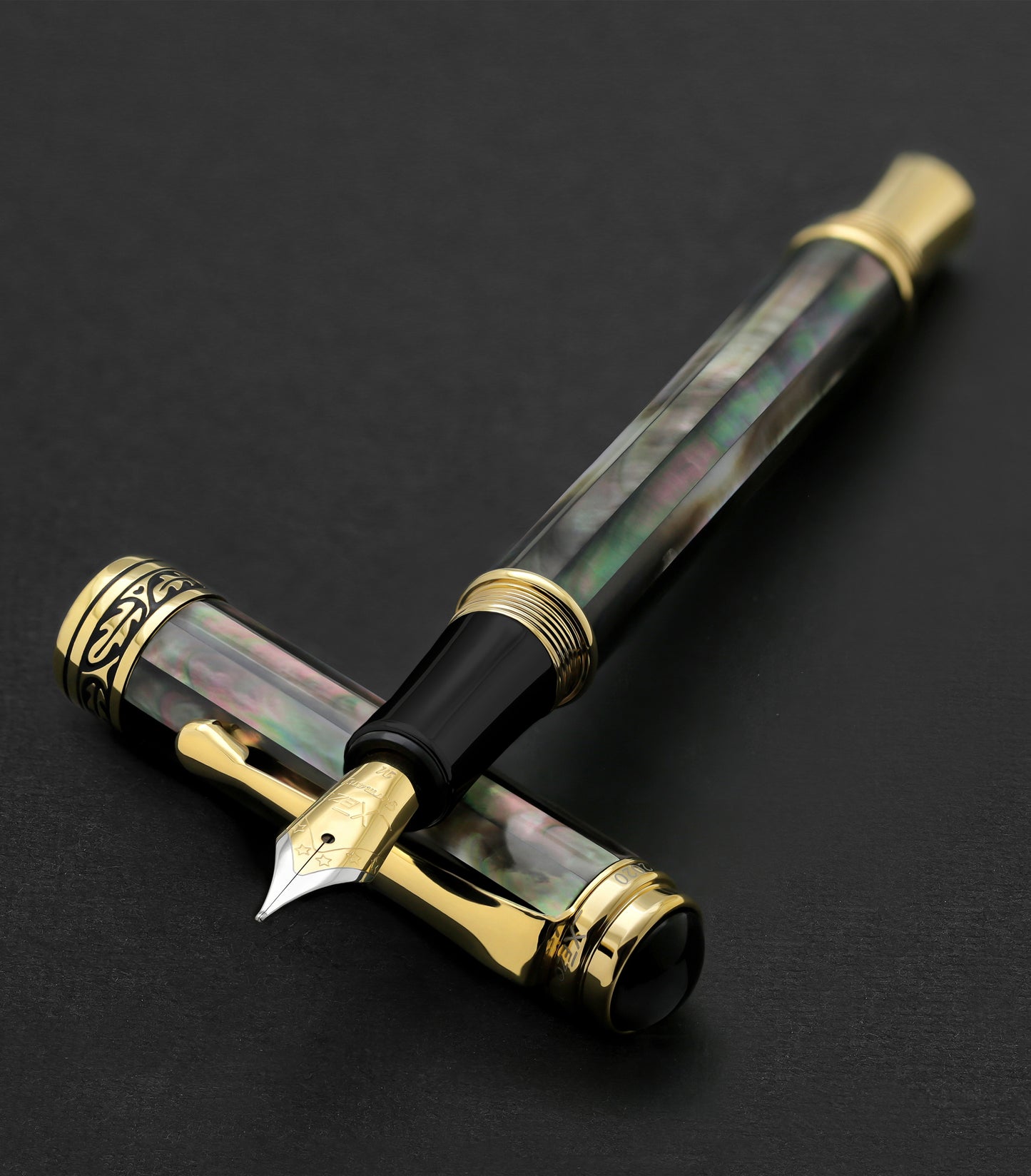 Xezo - Maestro Tahitian Black MOP FM fountain pen resting on its cap